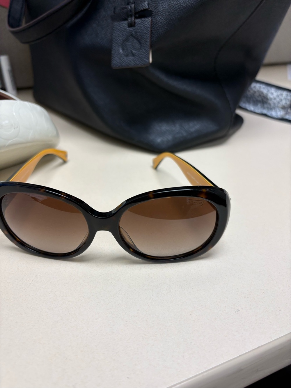 Coach Tortoiseshell Oval Sunglasses with Brown Gradient Lenses